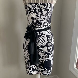 White House | Black Market 
White and Black Floral Strapless Dress with pockets
